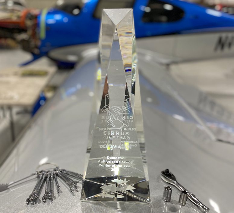 Airplane maintenance tools near award trophy