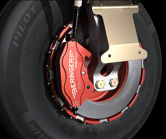 Aircraft wheel with red Beringer brake caliper
