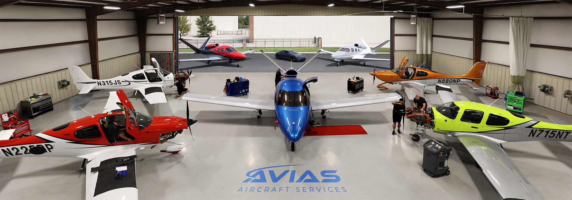 Colorful airplanes inside a hangar